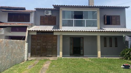 Tramandai Casa | Casa com 4 quartos e piscina pra aproveitar