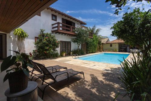 Praia Rasa Casa | Casa com 4 Suítes e Piscina em Búzios | PZ 1214
