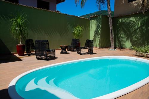 Mambucaba Casa | Casa com Piscina e Churrasqueira no Pantanal