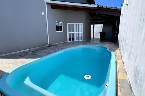 Indaia Casa | Casa com piscina em Bertioga -SP (1)