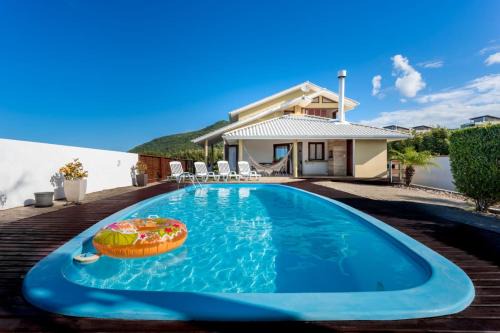 Santinho Casa | Casa com piscina frente ao mar Praia do Santinho