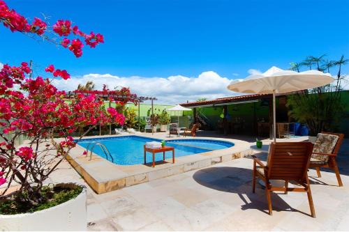 Jacauna Casa | Casa com Piscina na Praia do Iguape by Carpediem