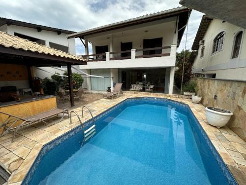Pereque Casa | Casa condomínio 8 pessoas, piscina, churrasqueira