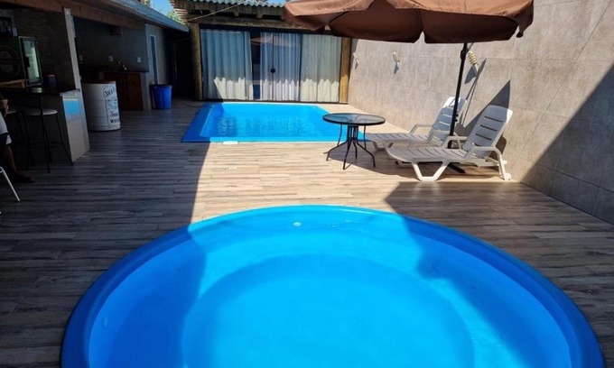 Tabuleiro Casa | Casa da Piscina Camboriú