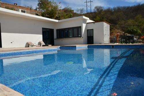 Álamos Casa | Casa de Cuatro Vientos