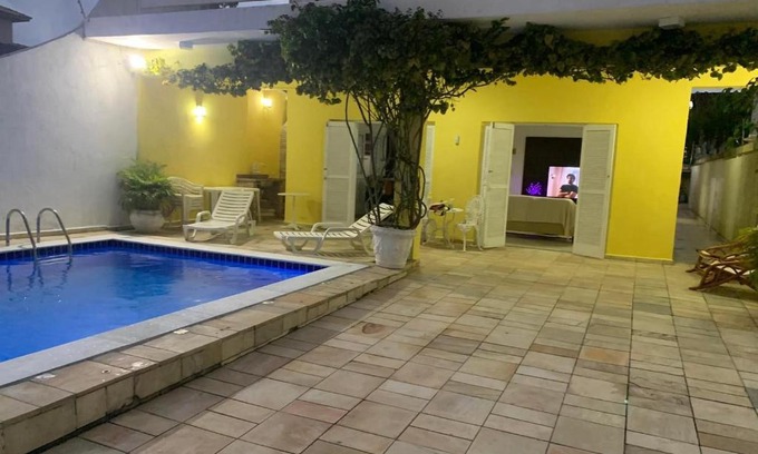 Jardim Centenario Casa | Casa de férias no Guarujá.