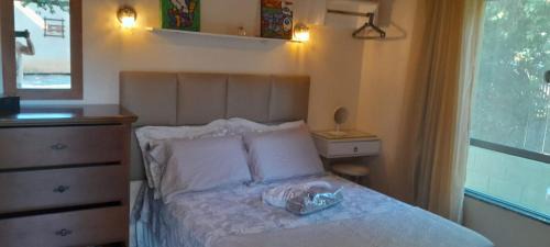 Praia Rasa Apartamento | Casa de hospedes em condominio com lazer