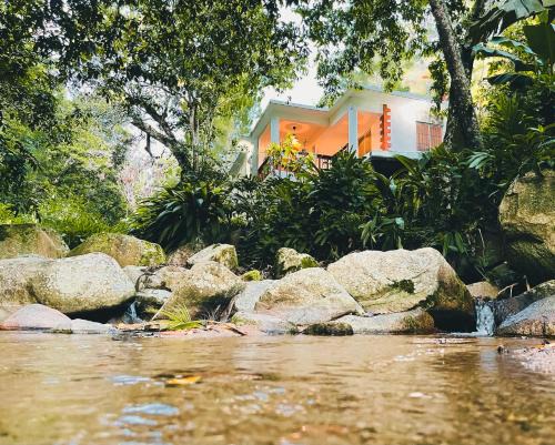 Jarabacoa Casa | Casa del Arroyo 2-Bedroom Cottage Fireplace and BBQ