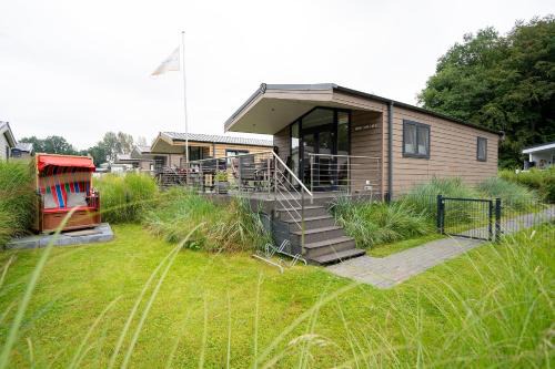 Gronenberg Casa | Casa del Mar Scharbeutz - Sauna kostenlos - 1 kleiner Hund willkommen - umzäunter Garten