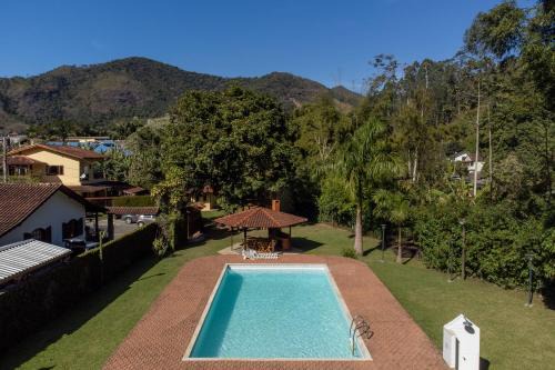Lumiar Casa | Casa Di Maria 4 Quartos a 500m Centro - Sauna, Piscina, Fogão a Lenha, Churrasqueira - ACESSO PRIVATIVO AO AO RIO - Ideal para famílias