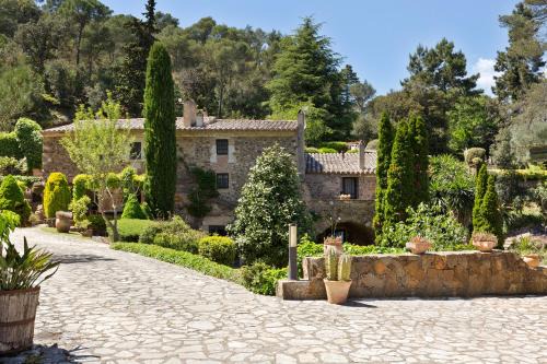 Mont-Ras Casa | CASA EL MOLI DE CAN BURJATS con piscina y chimenea