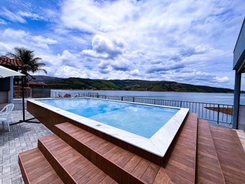 Capitolio Casa | Casa em Capitólio com piscina e vista para lago | W1