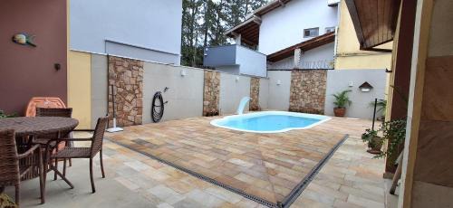 Horto Casa | Casa em Condomínio com Piscina e Lago em UBATUBA
