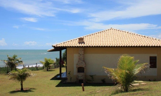 Zumbi Casa | Casa espetacular em condomínio pé-na-areia, RZ15