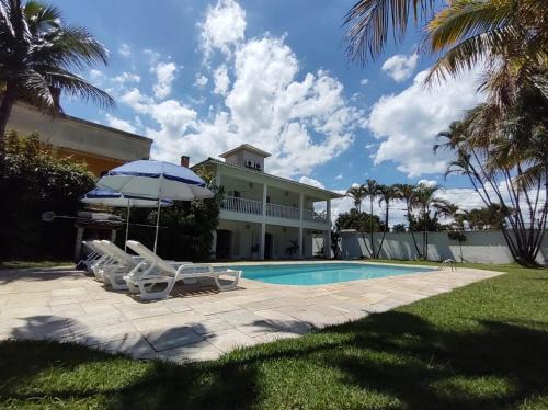 Balneario Praia do Pernambuco Casa | Casa Eventos e Temporada com 4 suites, piscina, churrasqueira, Wi-Fi, Ar Condicionado - Proximo Praia Mar Casado e Pernambuco - Guaruja -