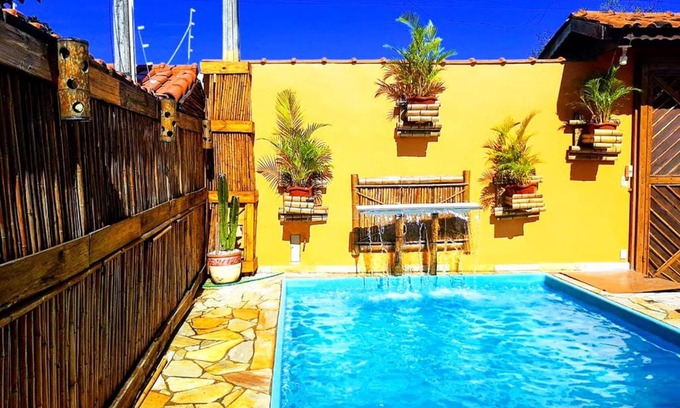 Jardim Santa Tereza Casa | Casa linda com Piscina e Jogos, pertinho da Praia