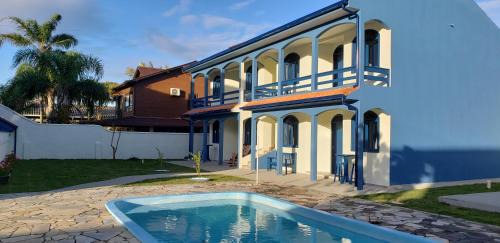Pinheira Apartamento | Casa Miosótis apartamentos