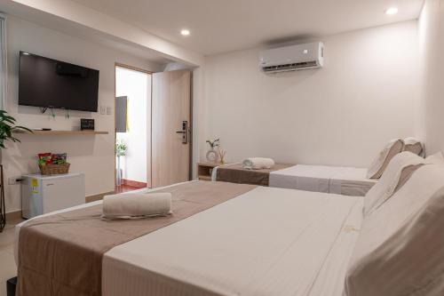 Manga Casa | Casa Mishka Hotel Boutique Habitación #105 Nuevo Cartagena