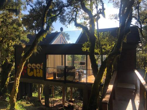Vacas Gordas Cabina | Casa na árvore com banheira de imersão e lareira