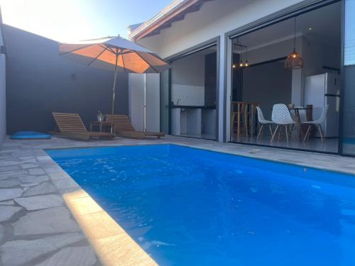 Costeira Casa | Casa nova com piscina e lareira