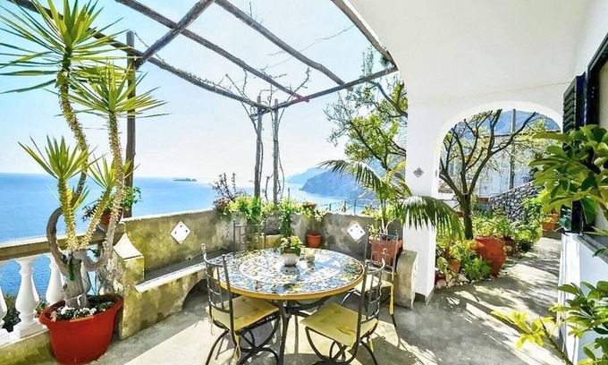 Arienzo Casa | Casa Odetta: Un luminoso apartamento frente al sol y al mar.