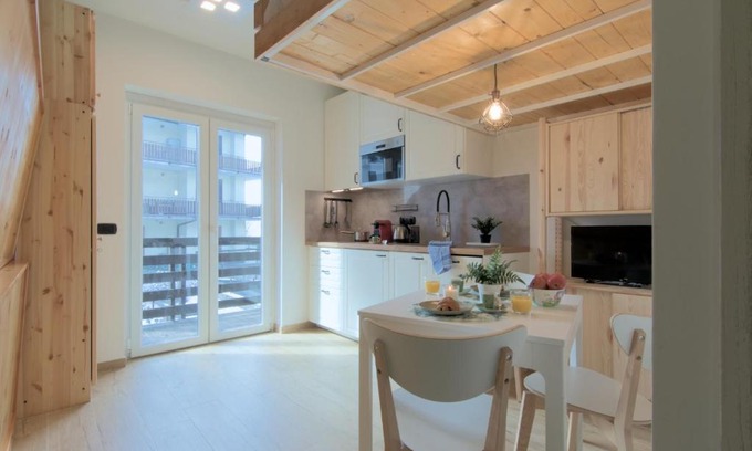 Aprica Apartamento | Casa Pino- Loft con giardino Magnolta