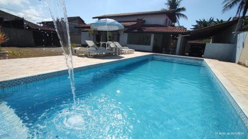 Jardim Neptunia Casa | Casa piscina pé na areia Bertioga