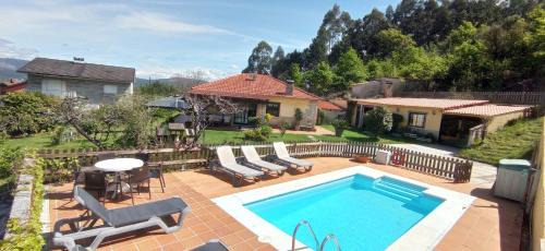 Santa Cristina de Cobres Casa | Casa Rural Pontevedra con piscinajardínbarbacoa