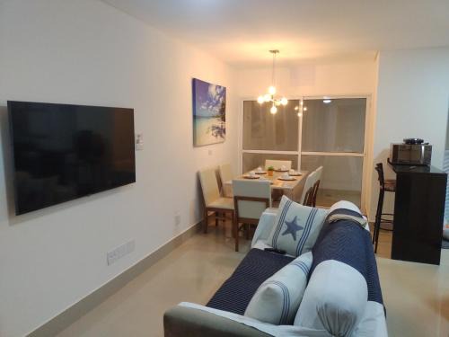 Balneario Cidade Atlantica Casa | CASA SETE ENSEADA AR COND Suíte E ESTACIONAMENTO GRÁTIS e uma ótima localização na enseada