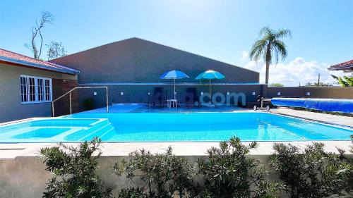 Guaratuba Casa | Casa Sol da Manhã - Piscina aquecida com hidromassagem - 300m da praia