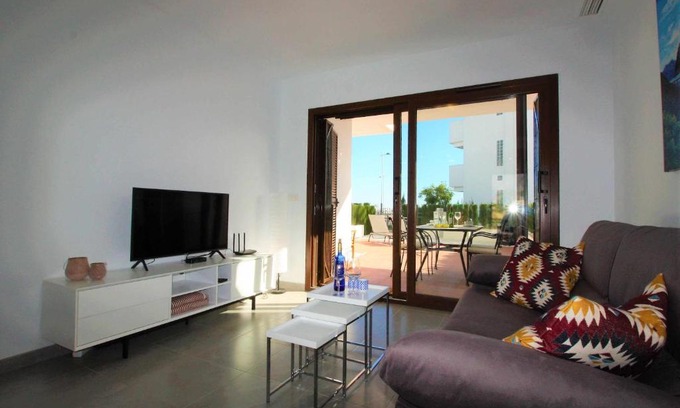 Mar de Pulpi Apartamento | Casa Tapas y vino apartamento con jardin y piscina comunitaria