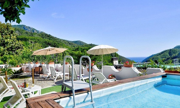 Pucara Casa | Casa Trifone D: A graceful apartment that is part of a villa surrounded by the greenery, with Free WI-FI.