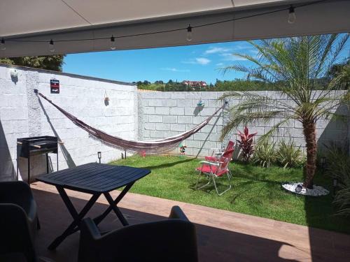 Serra Negra Casa | Casa1sn - Casa completa com jardim privativo e chuveirão refrescante!