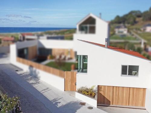 Arnados Casa | Casita con jardín en playa de Razo