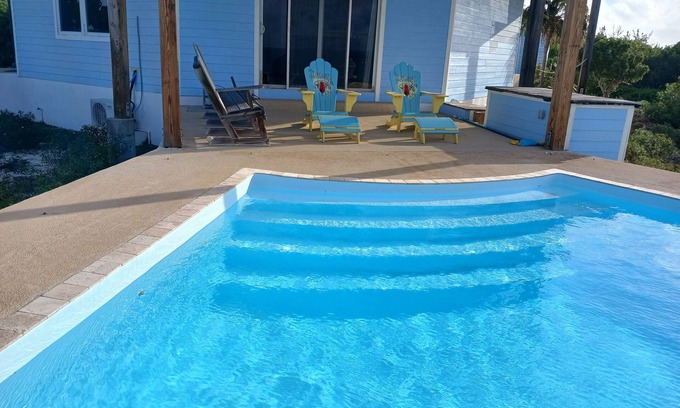 Port Howe Casa | Cat Island Paradise . Overlooking turquoise waters and sky, sunrise and sunset.