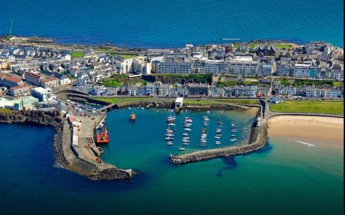 Portrush Casa | Causeway View perfect for large golf groups seafront central location, pet friendly, see dolphins