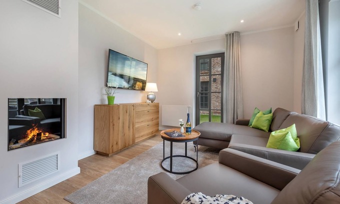 Zingst Apartamento | Central newly built vacation apartment with gas fireplace near the beach for 4 pers.