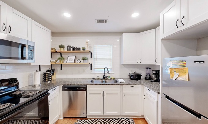 West End Casa | Centrally located West End home with 2 apts, AC, & W/D - dog-friendly