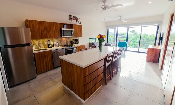 Playa Chahué Condominio | Centrally located with private rooftop terrace with views, BBQ and shared pool.