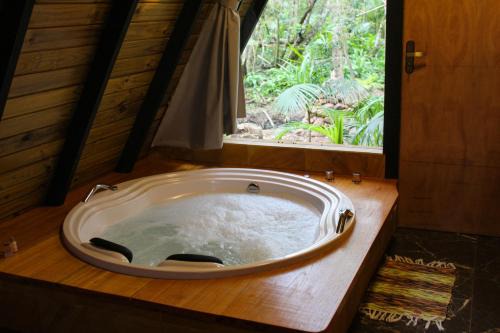 Praia Grande Casa | Chalé Suiço com Hidromassagem e café da Manhã