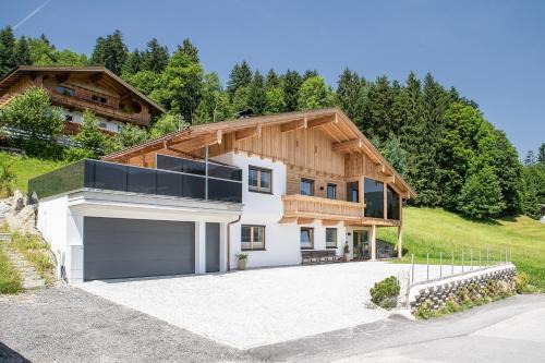 Fuegenberg Casa | "Chalet Bergzeit" Ferienhaus mit Sauna & Wellness