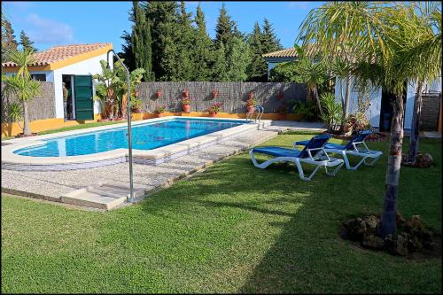 Conil de la Frontera Chalet De Esquí | Chalet con piscina en Roche Viejo