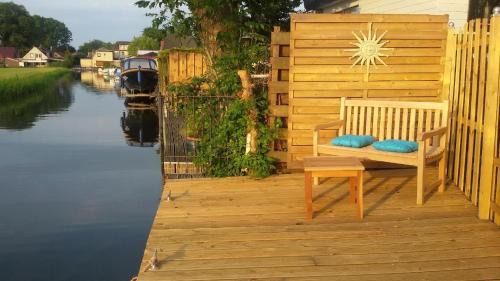Onderdijk Apartamento | Chalet direkt an der Gracht mit eigenem Bootsanlegesteiger