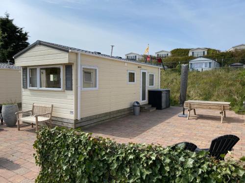 IJmuiden Chalet De Esquí | Chalet Ibiza in de duinen van IJmuiden aan Zee