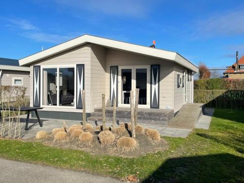 Kamperland Chalet De Esquí | Chalet (J09) op gezellige familiecamping bij zee