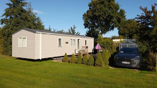 Kropswolde Apartamento | Chalet Meerwijck mit Terrasse am Wasser und Meer mit Schwimmbad