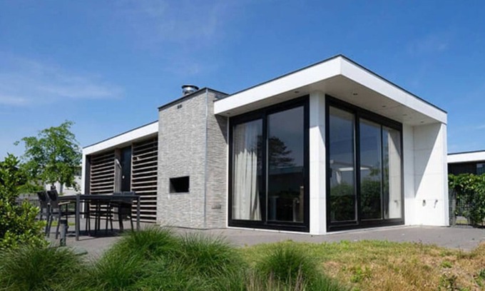 Nunspeet Chalet De Esquí | Chalet sobre el agua en la hermosa Veluwemeer
