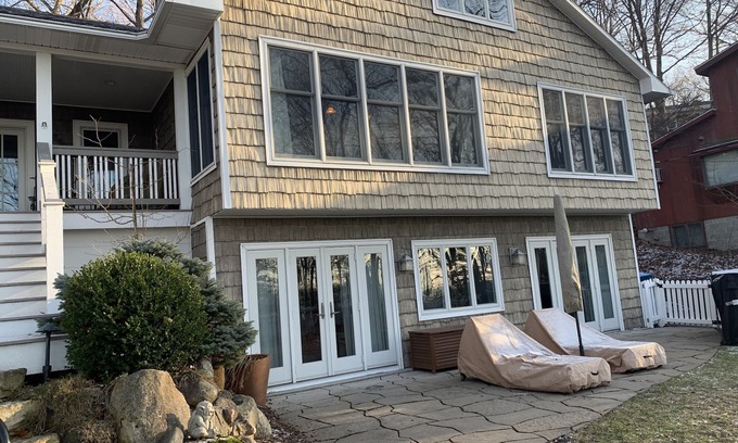 Shorewood-Tower Hills-Harbert Casa | Charmer with lake views, hot tub, fire pit, and short walk to private beach.