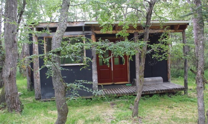 Puerto Natales Cabina | Charming 2 bedroom cabin nestled in the woods just outside of Puerto Natales.