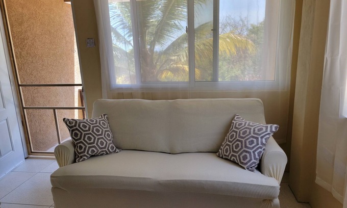 Crochu Apartamento | Charming 2-bedroom hideaway near Cabier, full kitchen and air-conditioned rooms.